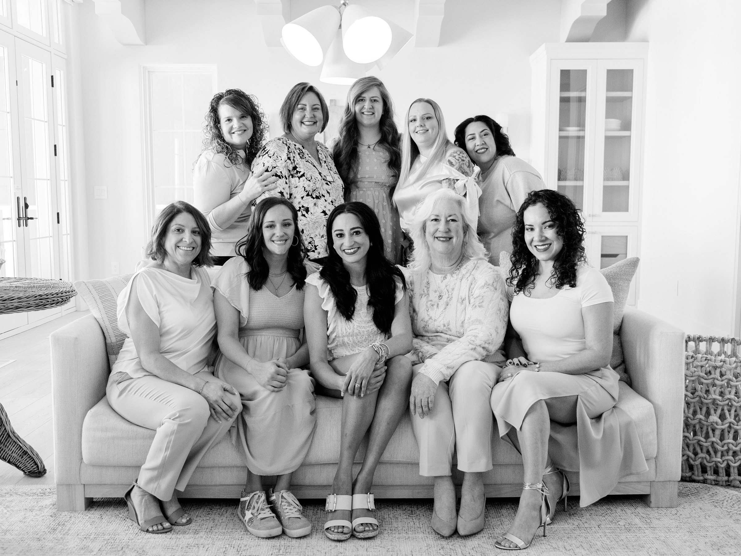 The Utah retreat group gathered together on and around a sofa