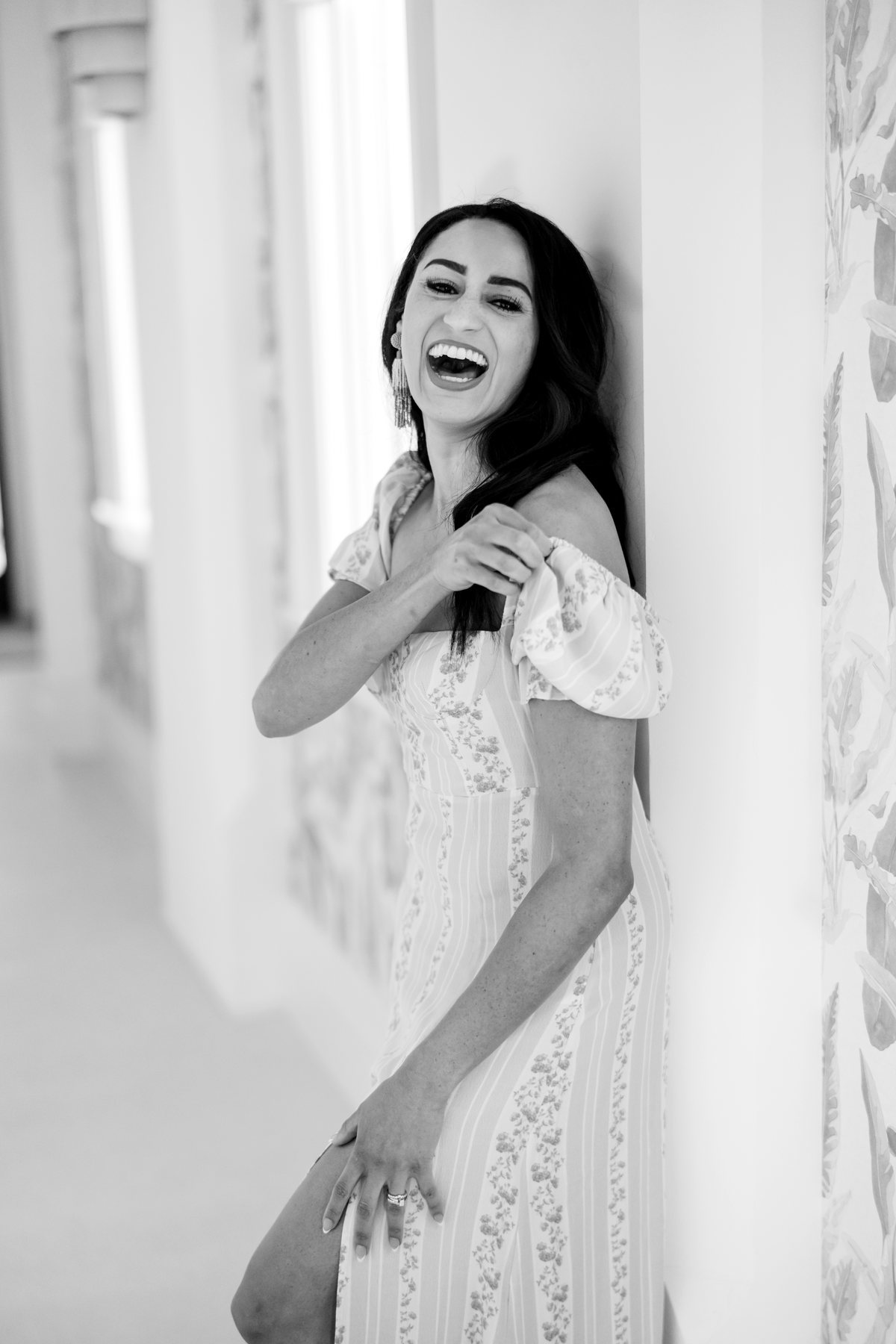 Black and white photograph of Macie Renae laughing